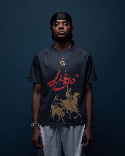 High-performance football jersey made from 100% polyester. Designed with finer side panels to enhance breathability during intense activity. Features a fully embroidered club logo on the chest and sublimated graphics for long-lasting visual detail. 
